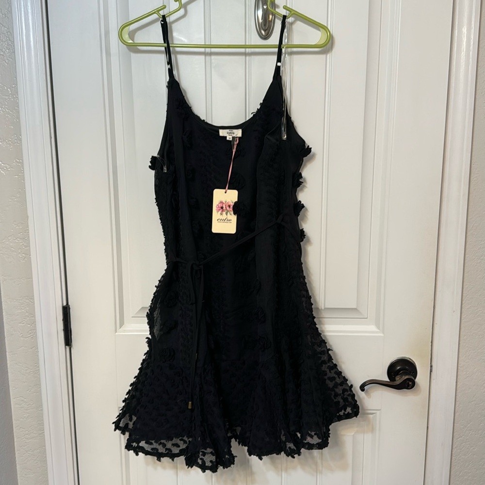 Black textured mini dress. Size M